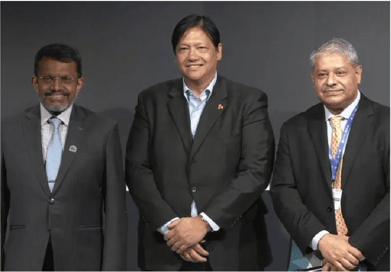 Francia with MAS Managing Director Ravi Menon and The Rockefeller Foundation SVP Ashvin Dayal after announcing their groundbreaking partnership for transition credits at COP28