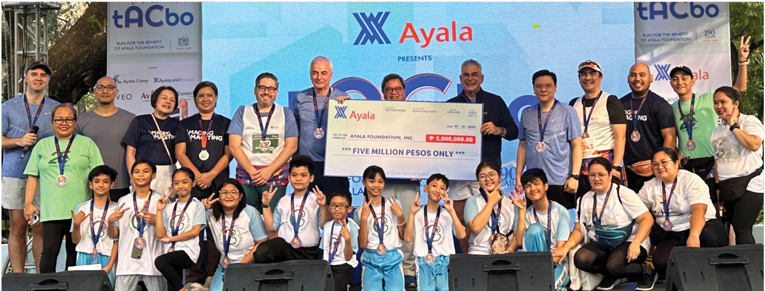 Jaime Z. Urquijo, Paco Romero Milán, FZA, Bong Consing, and JAZA present a ceremonial check for P5 million to Ayala Foundation, led by its president Tony Lambino, in support of its education programs; AFI also received a check for P1 million from Ayala Coop.