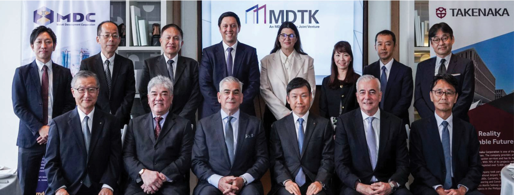 At the launch ceremony for MDTK Corporation held on March 21 are (seated, from left) Takenaka Overseas Construction Business Executive Managing Officer Shoichiro Shibuta; ALI SVP, MDC President and CEO, and MDTK Chairman Dante Abando; ALI Chairman Jaime Augusto Zobel de Ayala; Takenaka Corporation Board Member and Senior Executive Managing Officer Yuichiro Takenaka; AC Board Director Fernando Zobel de Ayala; and Takenaka’s Asia Regional Headquarters Managing Officer and General Manager Hideki Izumi with ALI VP, MDC COO, and MDTK President Robert N. Baffrey and ALI SVP and Head of Leasing and Hospitality Mariana Zobel de Ayala (standing, 4th and 5th from left); and Takenaka executives Masao Doke, Tamotsu Takao, Masamichi Yamaguchi, Grace Lee, Takeshi Yanagi, and Ryusuke Kojio
