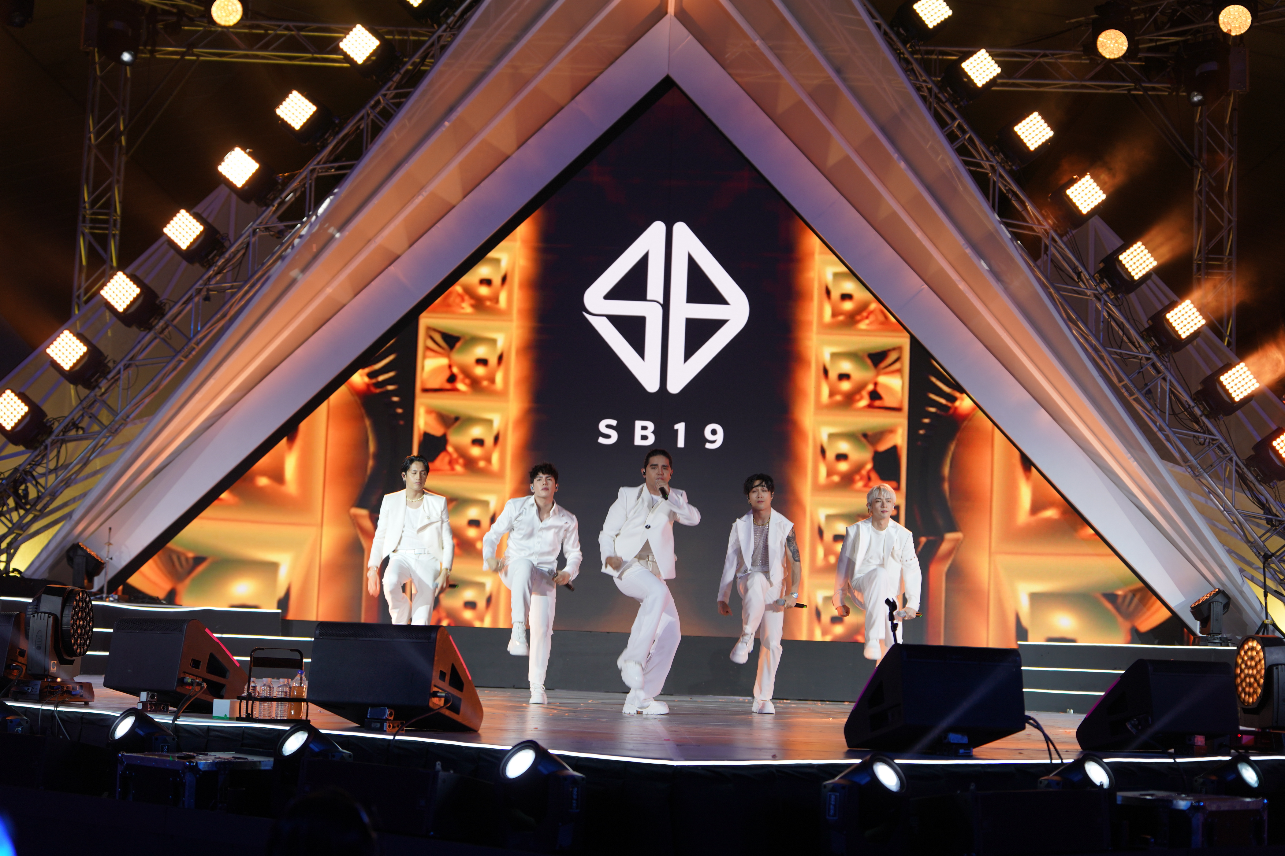 SB19 opens the concert with their latest hits.