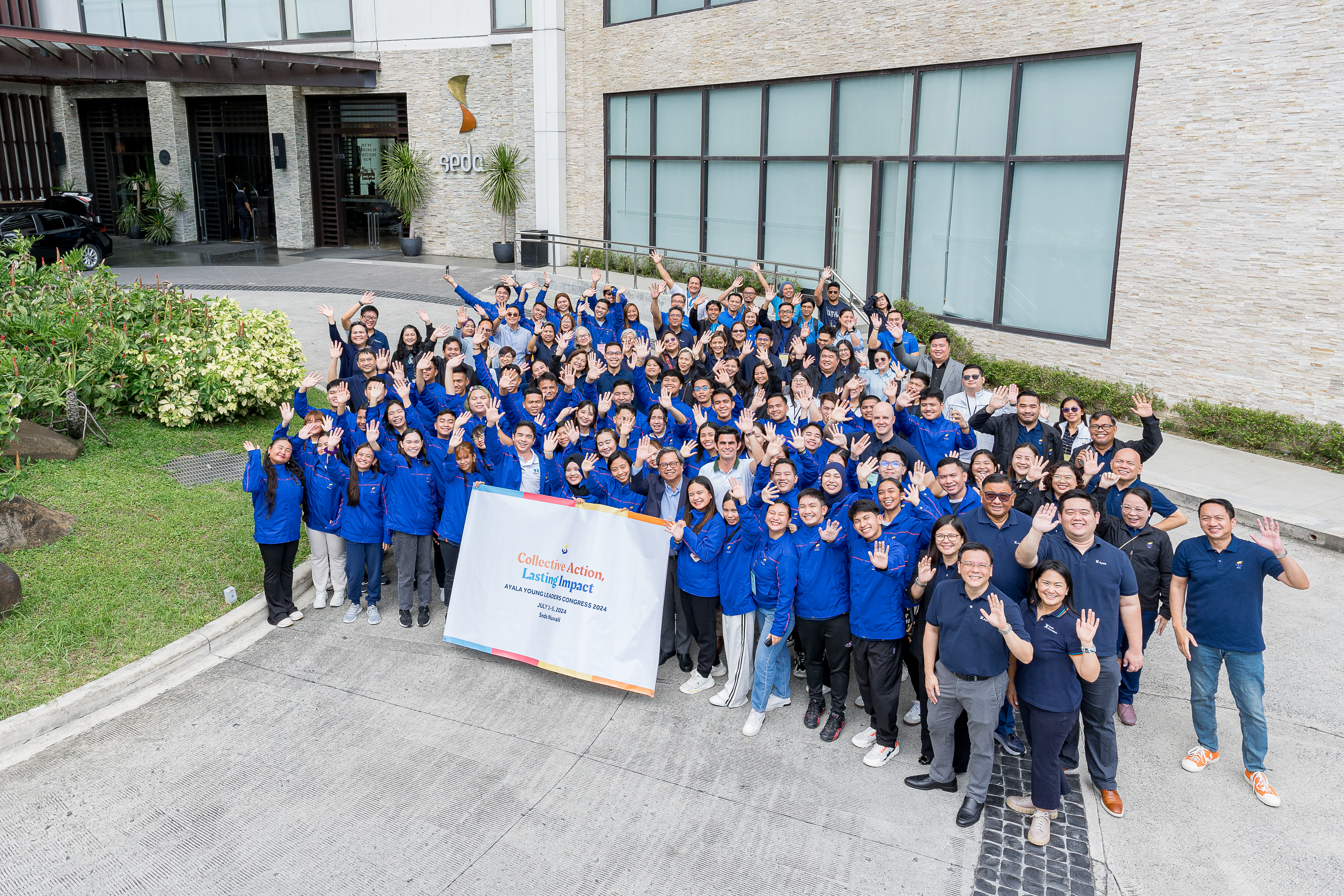 Delegates of the 26th Ayala Young Leaders Congress with senior leaders and representatives from Ayala companies led by AC President and CEO Cezar "Bong" Consing, Public Affairs Group Head Rene Almendras, Chief Sustainability and Risk Officer Jaime Z. Urquijo, Corporate Strategy and Business Development Group Head Mark Uy, and Corporate Governance Group Head Franchette Acosta; ACMobility CEO Jaime Alfonso Zobel de Ayala; and AFI President Tony Lambino.